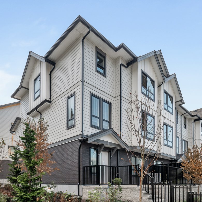 Exterior view of Signature Townhomes in Surrey with modern design.