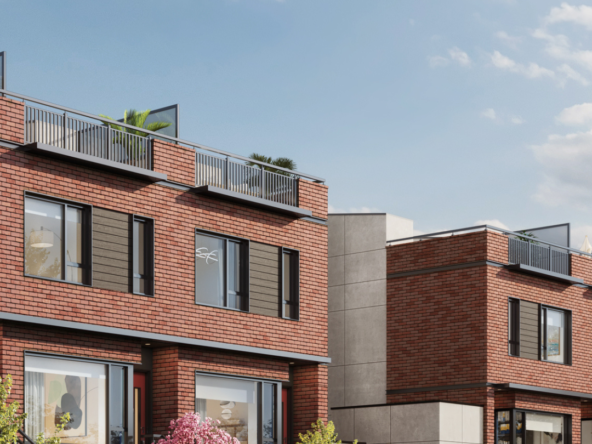 Exterior view of Kinsley at Queen Elizabeth Park in daylight with brick design.