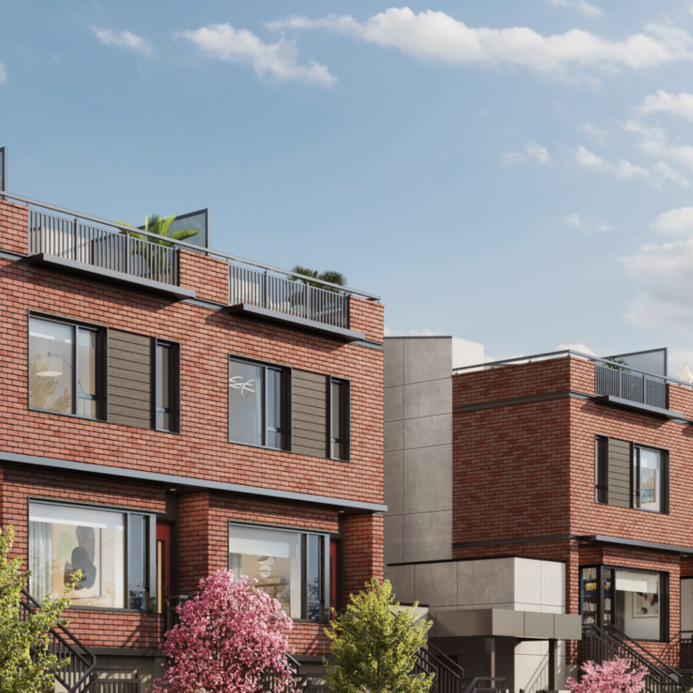 Exterior view of Kinsley at Queen Elizabeth Park in daylight with brick design.