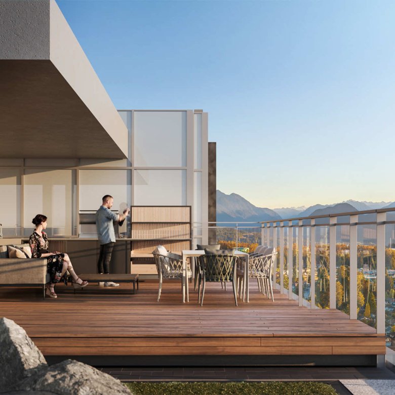 Rooftop lounge at Gardena with outdoor dining, seating and panoramic views of Coquitlam.